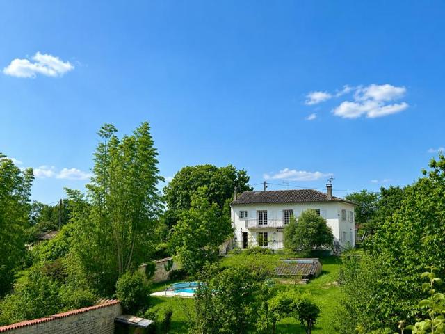 Exceptional Riverside Character Home with Heated Pool and Pa