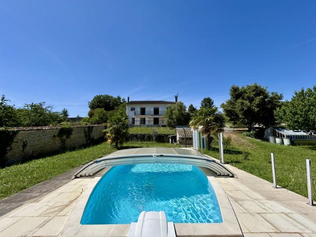Exceptional Riverside Character Home with Heated Pool and Pa