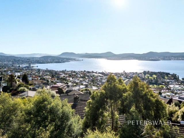 Exceptional Sandy Bay position with sweeping views and pre approved plans