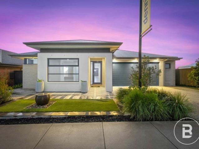 EXCEPTIONALLY DESIGNED AND BUILT FORMER DISPLAY HOME