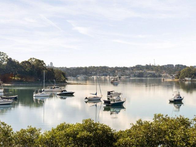 Exceptionally Rare Waterfront Apartment with Spectacular Views Across Hen & Chicken Bay and Level Lift Access