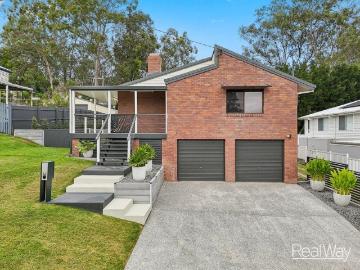 Exceptionally Renovated in Prestigious Sadliers Crossing