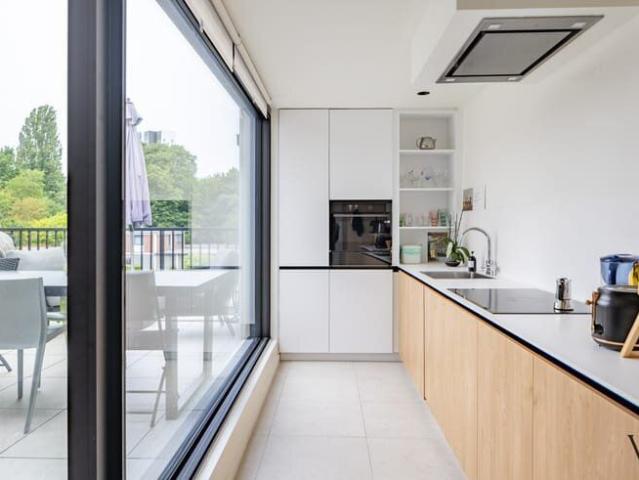 Exclusief triplexappartement met 4 slaapkamers in gerenov.