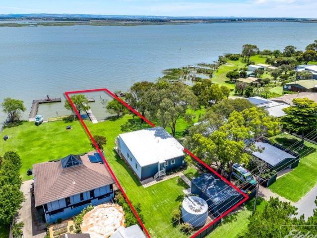 Exclusive Absolute Riverfront Living