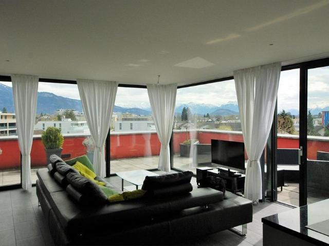 Exclusive attic apartment with large terrace and stunning mountain views