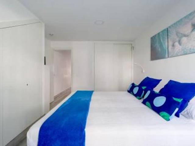 Exclusive Beachfront Apartment with Private Garden