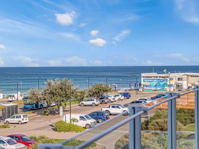 Exclusive Beachfront Penthouse with Stunning Ocean Views