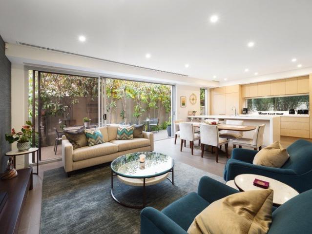 Exclusive Beachside Single Level Townhouse Residence