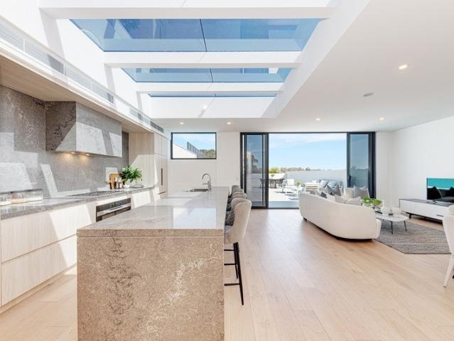Exclusive Designer Penthouse with Private Pool and Sweeping Views in a Boutique Block of 11