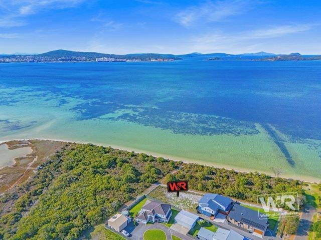 EXCLUSIVE HARBOUR RESERVE BOUNDED LOT TAP INTO VIEWS