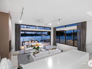 Exclusive north facing sanctuary with direct riverfront access