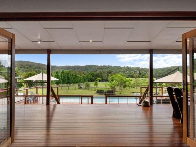 WATERFRONT ACREAGE LIVING WITH DIRECT MAROOCHY RIVER ACCESS