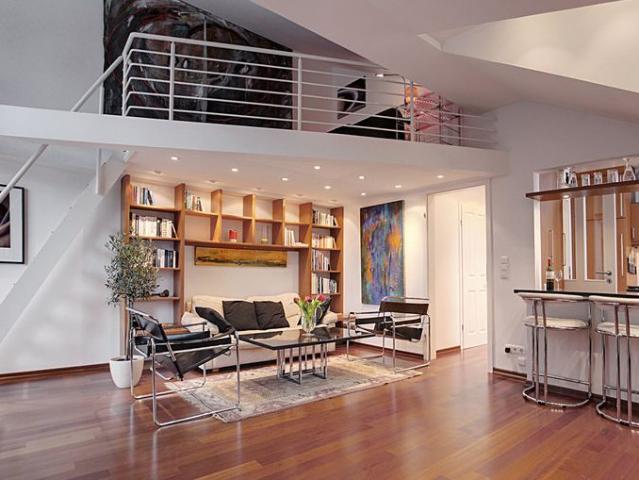 Exclusive top floor apartment with gallery and fireplace in Munich Altsolln, Munchen Amsterdam Apartments for Rent