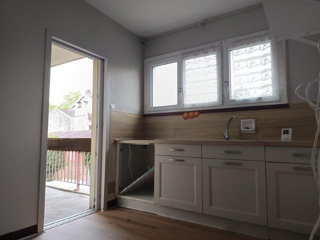 Appartement T3 traversant Est/Ouest avec 2 balcons, parking et cellier – Cœur de ville