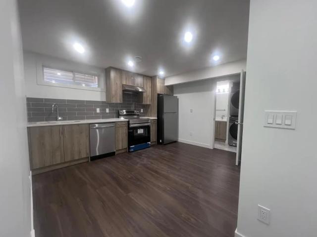 Executive 1BR Basement Suite, Prime Location!