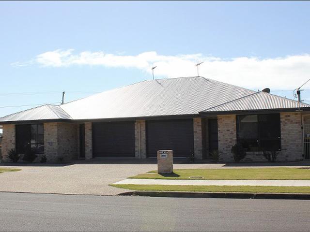 Executive 2 bedroom unit in a great location with high clearance powered shed
