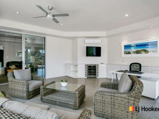 Executive Coastal Living with Panoramic Ocean Views Fully Furnished & Move In Ready