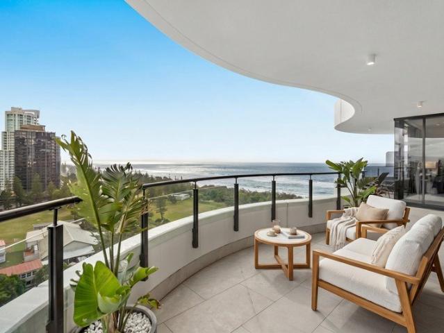 Executive Coastal Luxury: Bespoke 10th Floor Residence Metres from the Beach