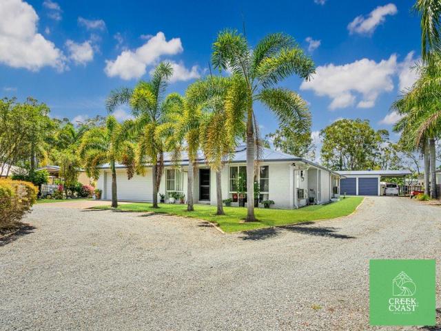 Executive Acreage Living in Prestigious Oakhurst