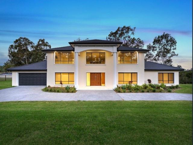 EXECUTIVE ACREAGE LIVING WITH SPACE FOR THE WHOLE FAMILY