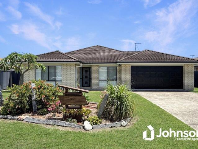 Executive family home with 4 bedrooms, study, multiple living zones and solar