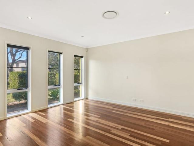 Executive Family Home with Lake Views & Pool in Prestigious Emerald Lakes