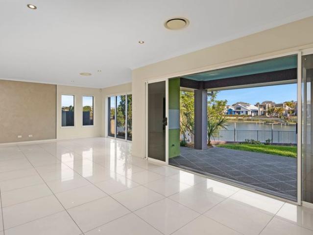 Executive Family Home with Lake Views & Pool in Prestigious Emerald Lakes