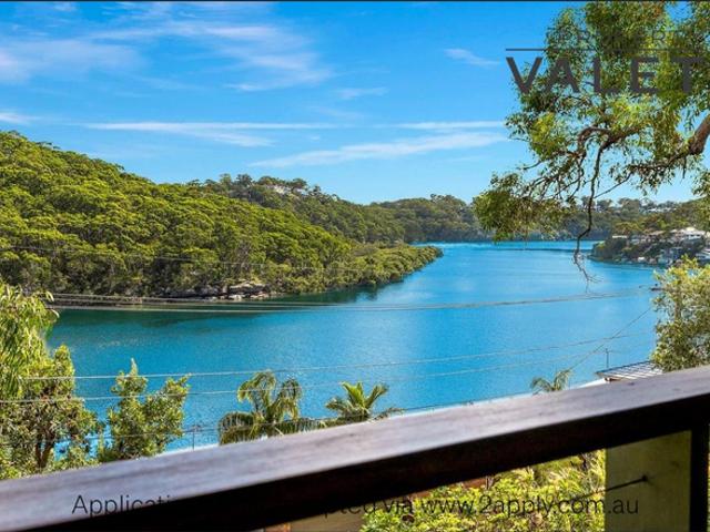Executive Family Living with Panoramic River Views