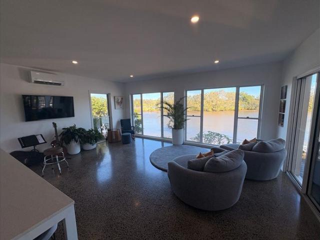 Executive home with resort style waterfront living in a quiet cul de sac in prestigious Oxley Cove Banora Pointliving