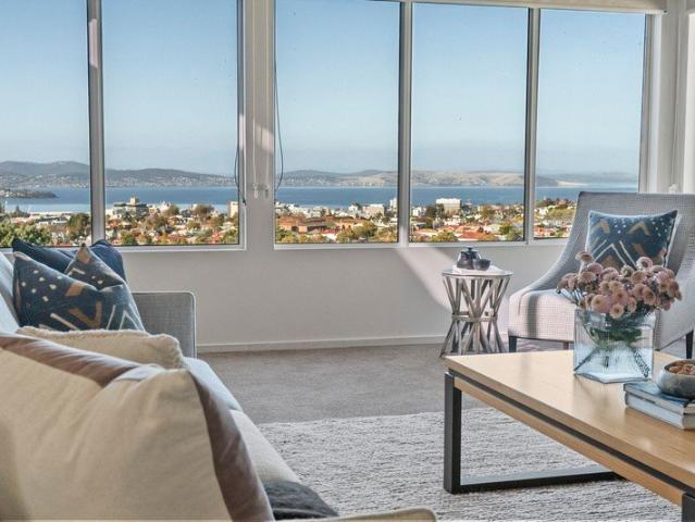 Executive Style with Panoramic City and River Views