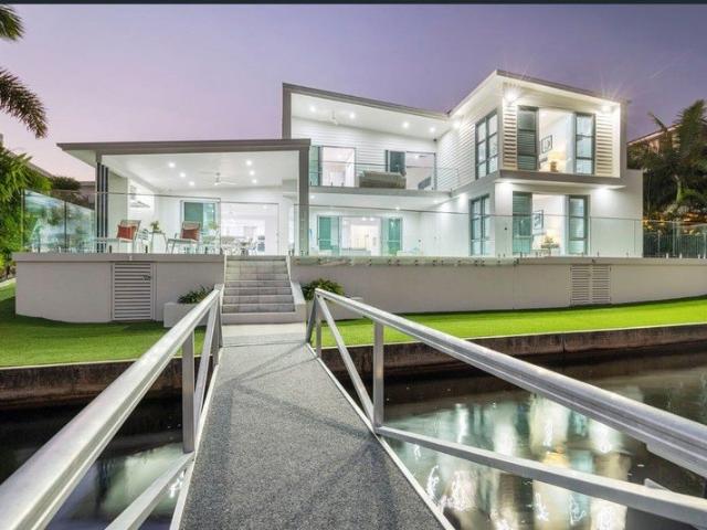 Executive waterfront home with pontoon in Pelican Waters