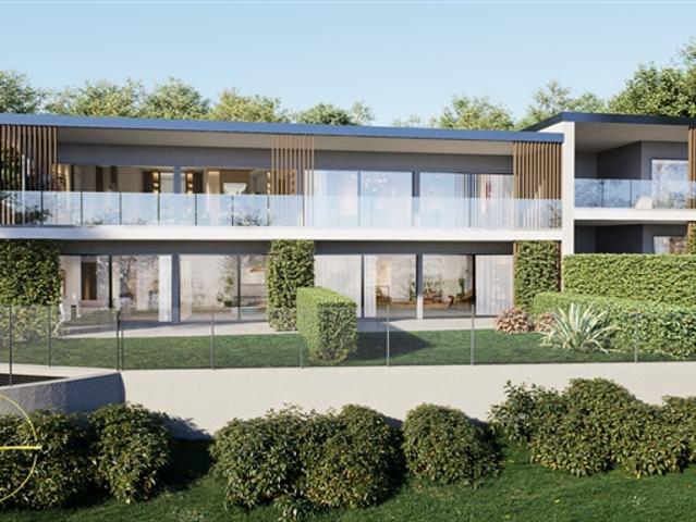 EXKLUSIV 3.5 ZIMMER MIT GARTEN IN LUGANO A1