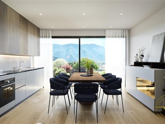 EXKLUSIV 3.5 ZIMMER MIT GARTEN IN LUGANO A2