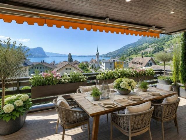 EXKLUSIVE 3.5 ZIMMER WOHNUNG MIT UNVERBAUBARER SEE UND BERGSICHT