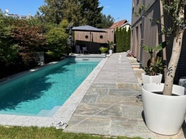 Exklusive 3 Zimmer Gartenwohnung mit Pool!