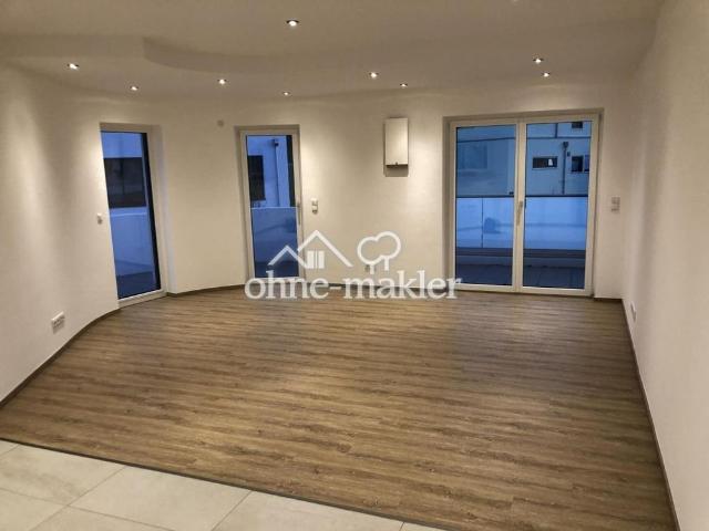 Exklusive 2 Zimmer Wohnung mit 31 m² Südwestbalkon, Aufzug & Tiefgarage – KfW 55 Effizienzhaus