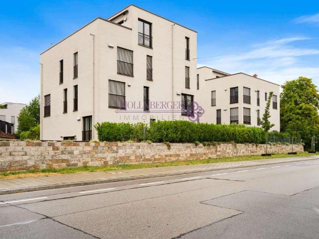 Exklusive 2 Zimmer Wohnung mit EBK, Terrasse, Garten und Doppel TG Stellplatz am Donaustrand!