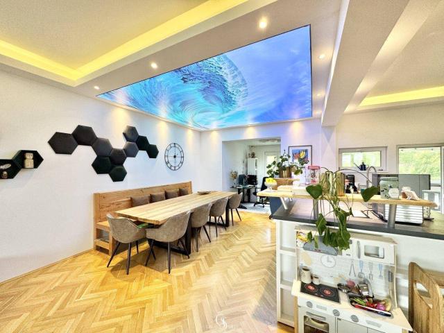 Exklusive 4,5 Zimmer Wohnung mit 156 m² Wohnfläche, Garten, Terrasse, Garage und hochwertiger Ausstattung