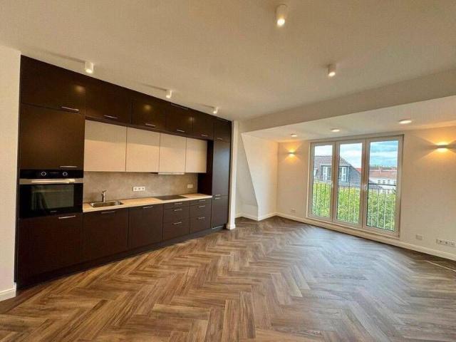 Exklusive Dachgeschosswohnung mit großer Dachterrasse Erstbezug nach Dachgeschossausbau
