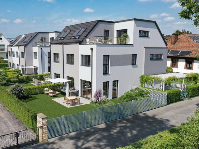 Exklusive Einfamilienhäuser, mit Südgarten in Ruhelage und DG Terrassen Appartment in Ziegelmassivbauweise