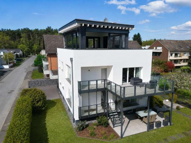 Exklusive Obergeschosswohnung mit Erdwärmepumpe und Balkon