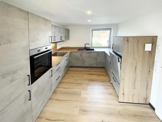 Exklusive Maisonette mit Haus in Haus Charakter: Kernsanierter Erstbezug!