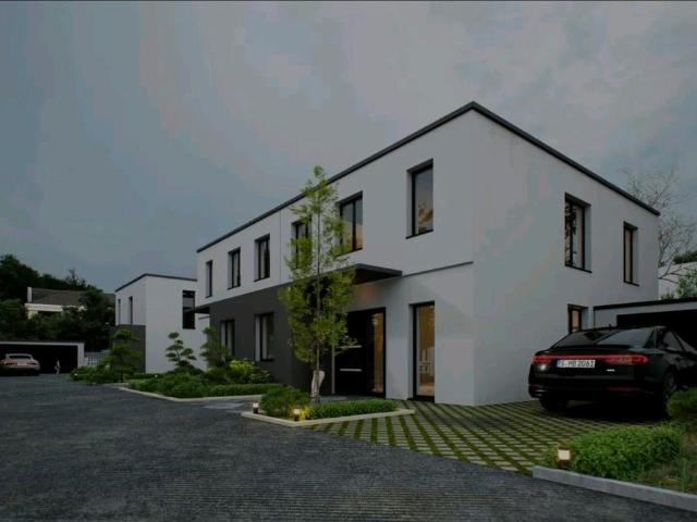 Exklusive Massive Neubau Doppelhaushälfte