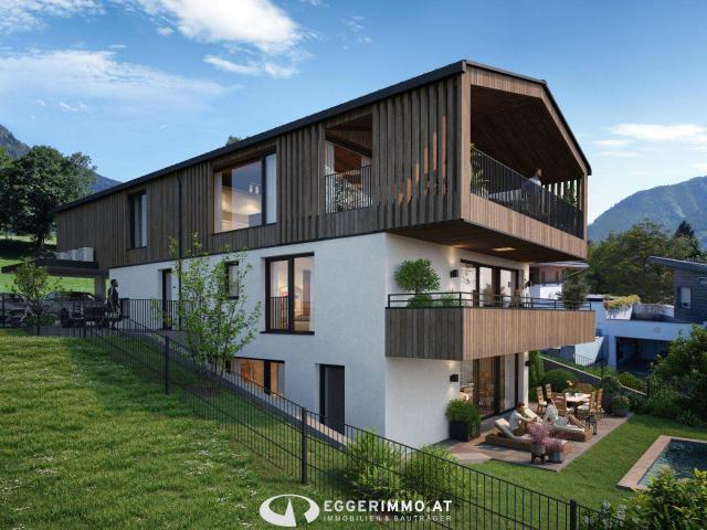 Exklusive Neubau Gartenwohnung mit großer Terrasse, weitläufigem Garten und privatem Pool in Maishofen