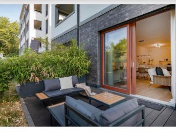 Exklusive Neubauwohnung mit großer Terrasse und Gartencharakter