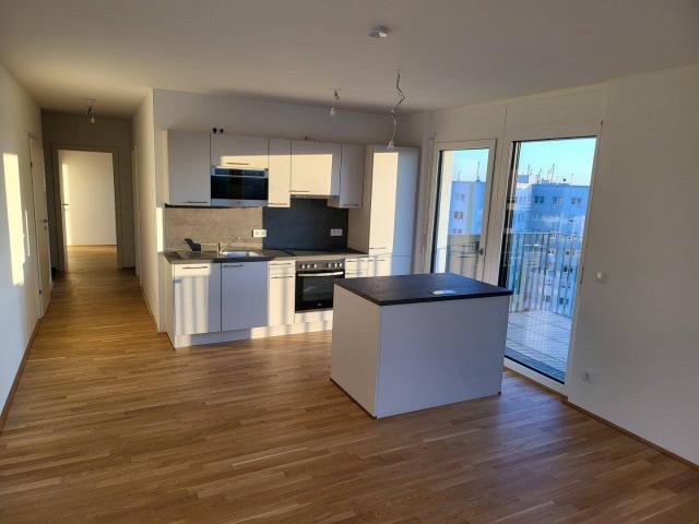 Exklusiver Neubau im 10. Stock mit Seeblick, Kochinsel & großzügigem Balkon – moderne 3 Zimmer Wohnung