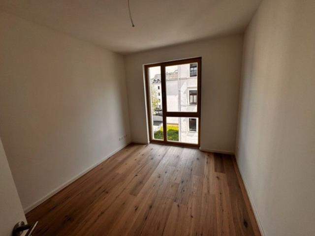 Exklusiver Neubau im Zentrum mit Balkon, Fußbodenheizung und Parkett!