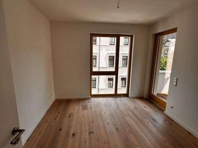 Exklusiver Neubau im Zentrum mit Balkon, Fußbodenheizung und Parkett!