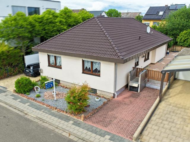 Exklusiver Bungalow mit barrierefreiem Wohnkonzept und großer Dachterrasse