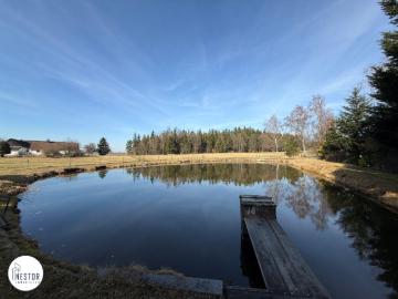 Exklusiver Fischteich | Einfamilienhaus Rohbau mit riesigem Grund in absoluter Ruhelage | Grünblick